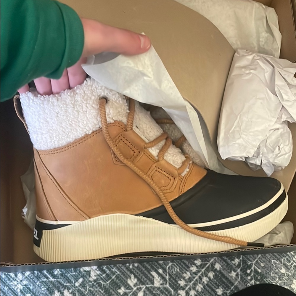 Sorel Tan and Black Winter Boots